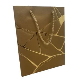 SACOLA-PPRESENTE-MARMORIZADA-DOURADA-23X18X10CM-PARTIU-FESTA-864337